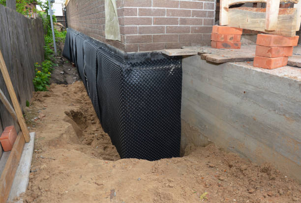 Happy homeowners after waterproofing job in Modena